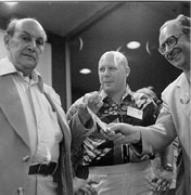 Photo of Horace L. Gold, E.J. Gold and Forrest J Ackerman in discussion